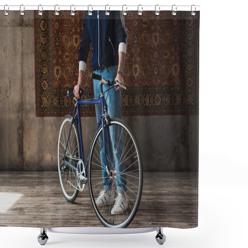 Personality  Cropped Shot Of Man In Vintage Clothes With Road Bike In Front Of Rug Hanging On Wall Shower Curtains