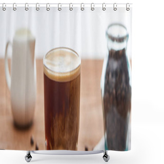 Personality  Selective Focus Of Ice Coffee With Milk In Glass Near Milk Jug And Coffee Grains On Wooden Table Isolated On White, Panoramic Shot Shower Curtains