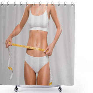 Personality  Partial View Of Beautiful Slim Woman In Underwear Holding Measuring Tape On Waist Isolated On Grey Shower Curtains