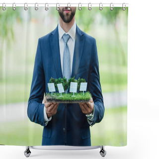 Personality  Cropped View Of Young Businessman Holding Park Layout With Sun Batteries While Standing In Park Shower Curtains