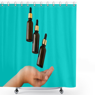 Personality  Bottles With Cosmetic Products Levitate Over Women's Hands On A Blue Background, Healthcare And Beauty Care Concept Shower Curtains