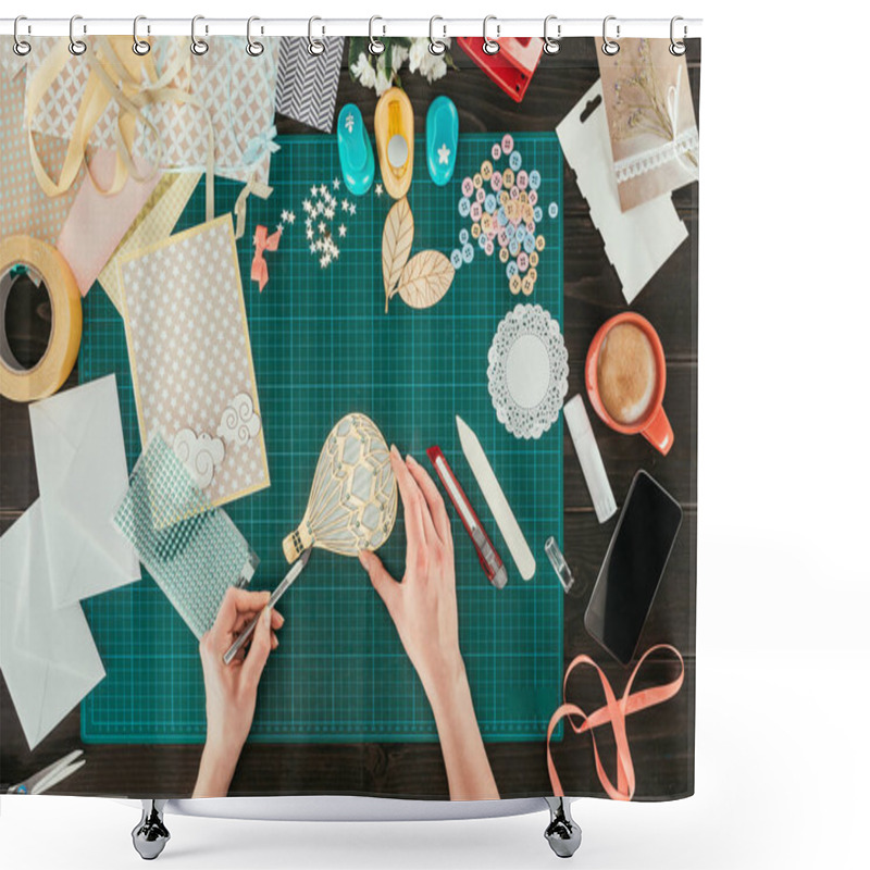 Personality  cropped image of woman putting sequins on scrapbooking balloon shower curtains