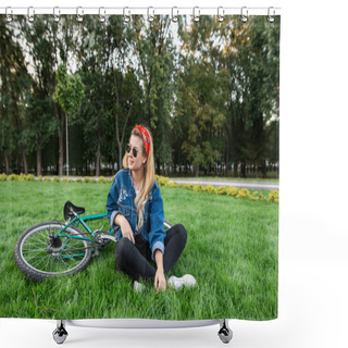 Personality  Stylish Attractive Young Woman Sits On A Lawn In A Park On A Lawn And Smiles. Beautiful Girl In A Stylish Outfit Resting On The Grass While Walking On A Bike.Relax Outdoors Shower Curtains