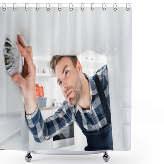 Personality  Focused Handyman Checking Freezer On Blurred Foreground In Kitchen Shower Curtains